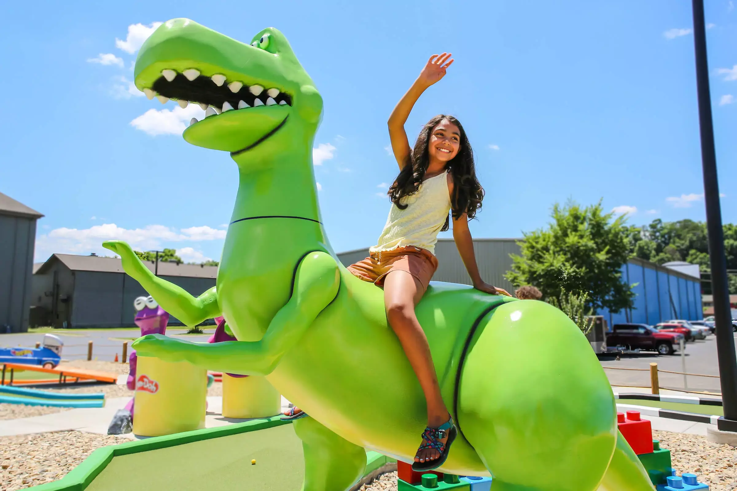 girl on giant dino