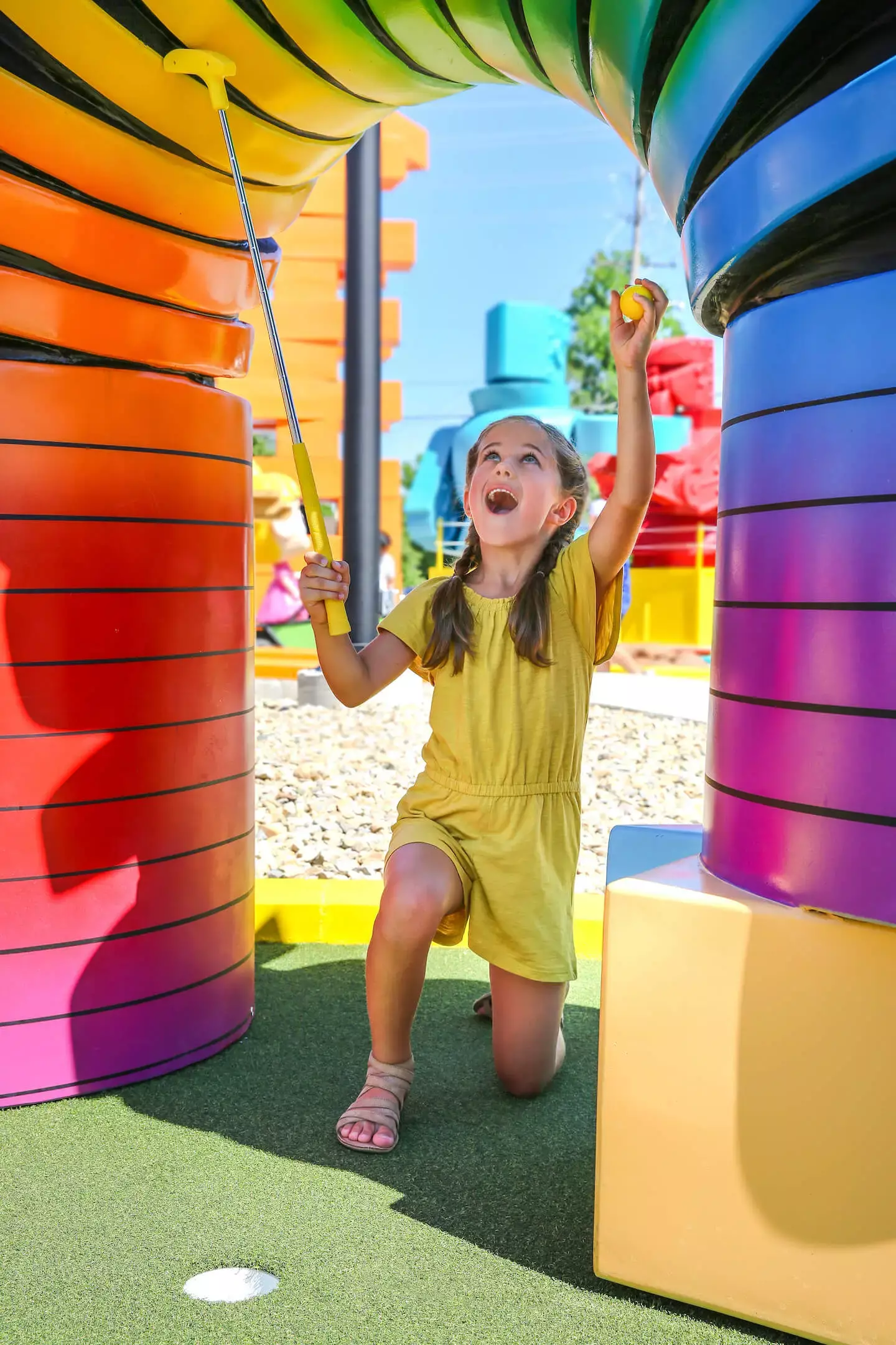 girl under slinky